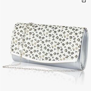 Clutch purse 
New still in wrapper